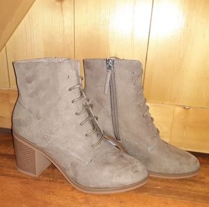 Tan lace up high heeled boots